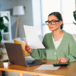 Expert crafting high-converting copywriting strategies on laptop