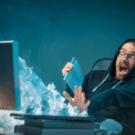 Marketer managing email warmup process on laptop to improve deliverability and avoid spam